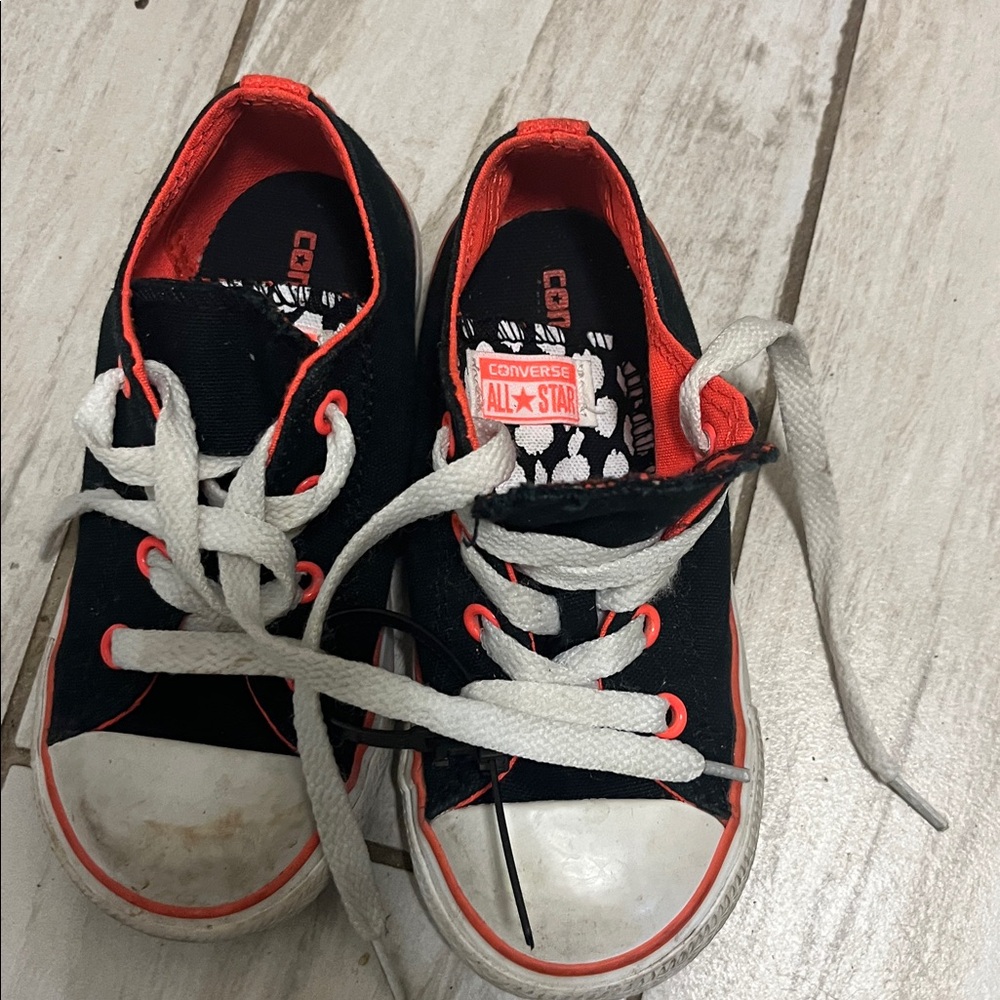Converse Black Sneakers with Red Highlights